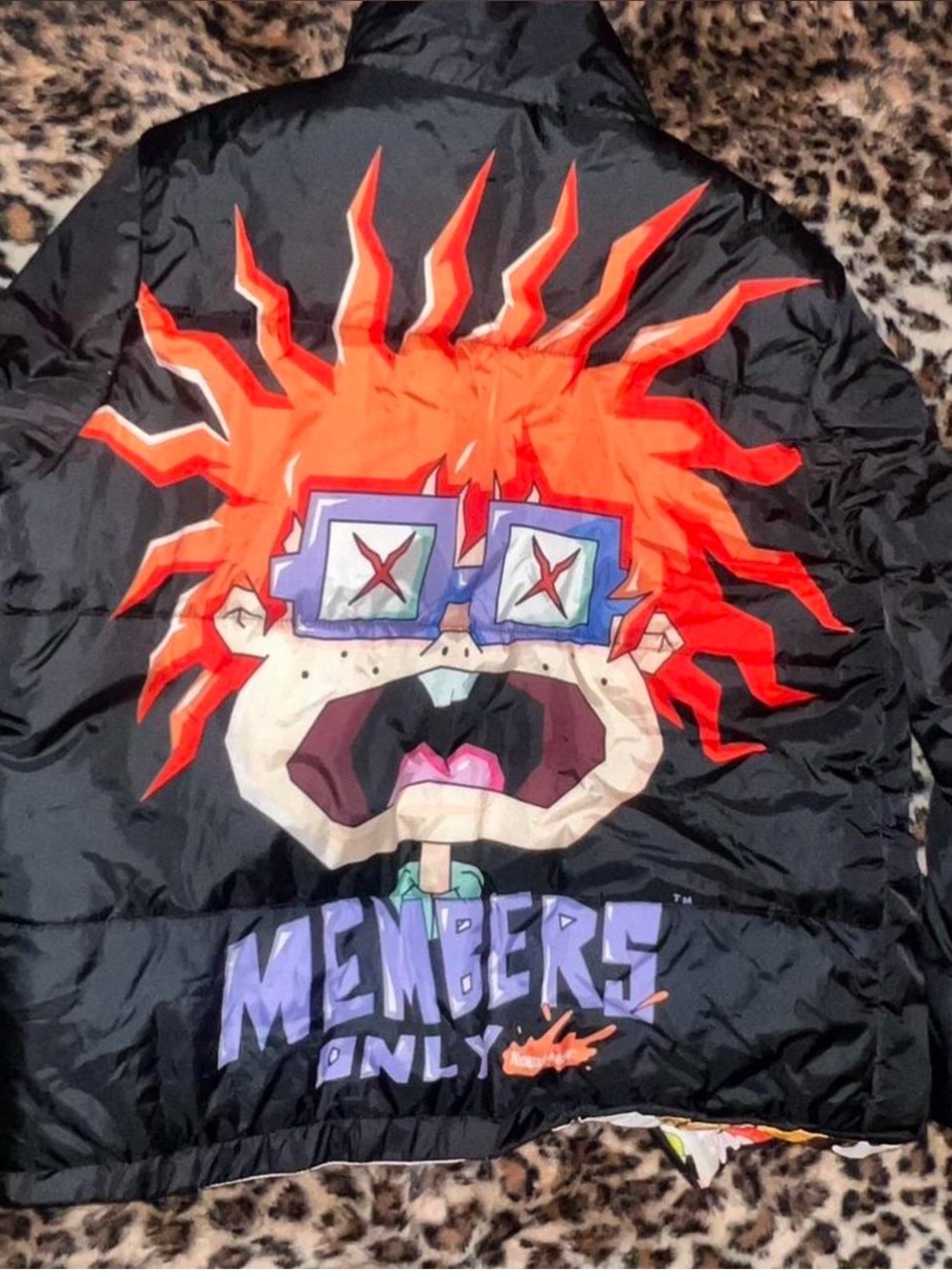 Members Only Black Puffer Jacket with Bright Orange Cartoon Back Graphic